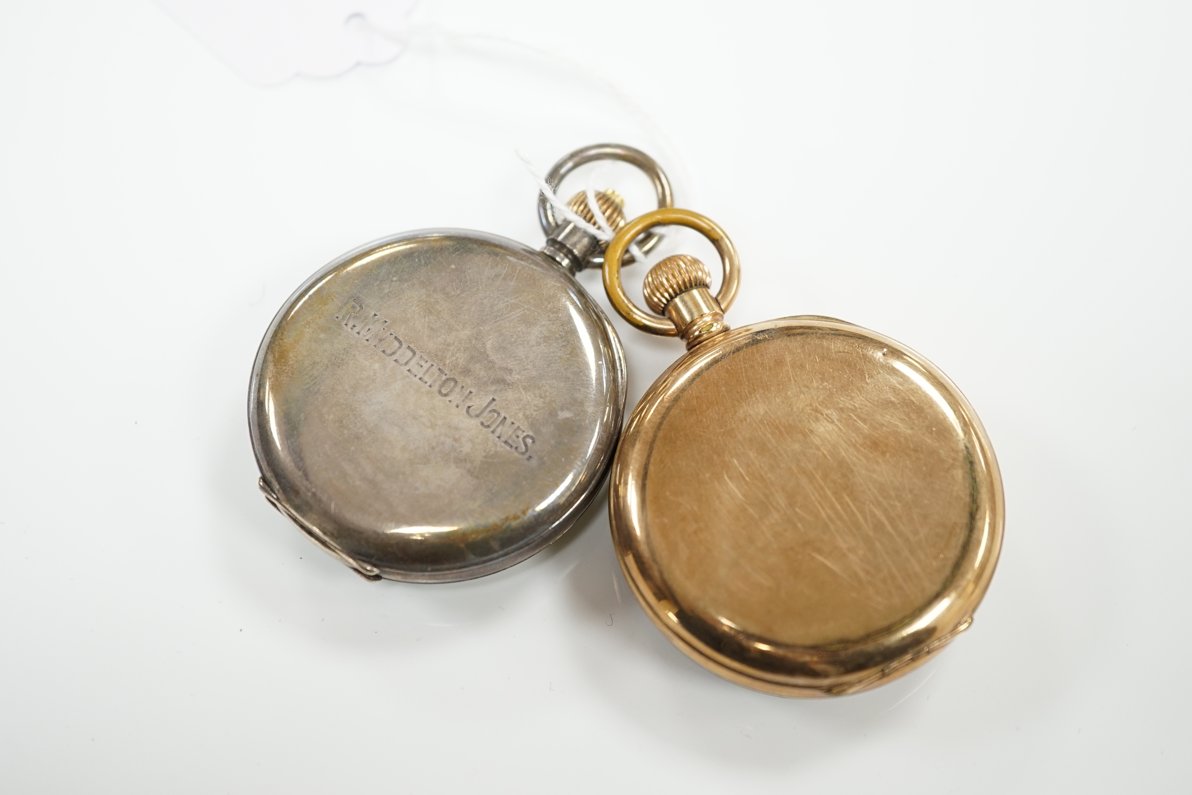 A Swiss 935 white metal open faced keyless pocket watch and a Waltham gold plated pocket watch.